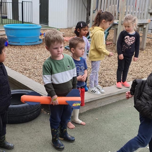 JigSaw Preschool - Preschooler group playing outside together