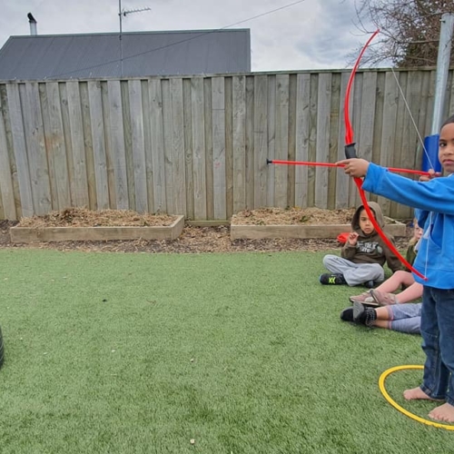 JigSaw Preschool - Kids doing archery